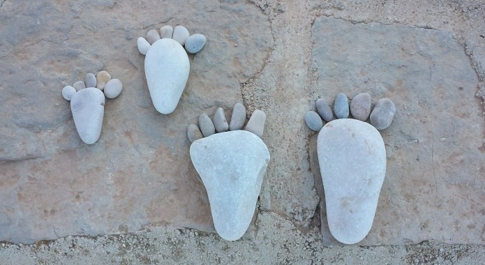 feet totem from pebbles