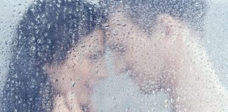 couple in shower having sex
