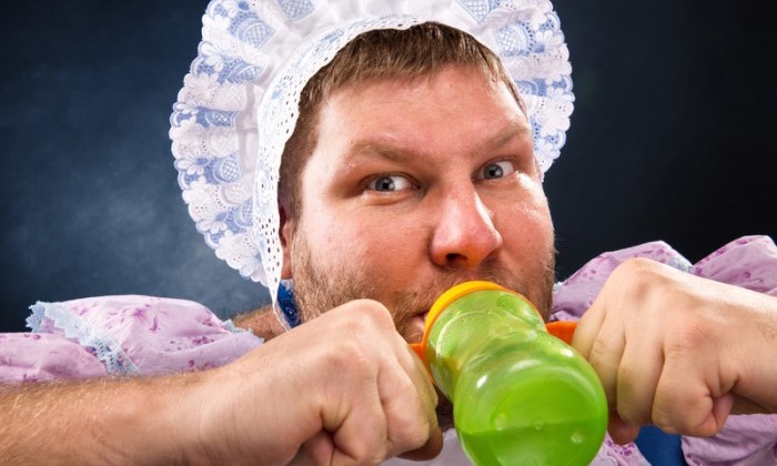 adult man in baby costume