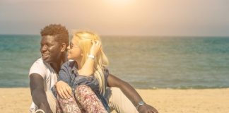 Cute Interracial Couple On Beach