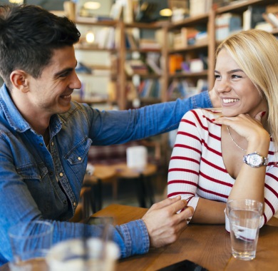 couple flirting in bar mobile