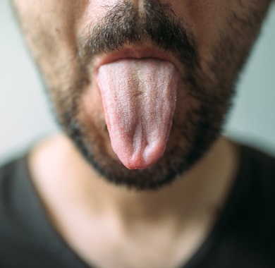 man sticking out tongue mobile